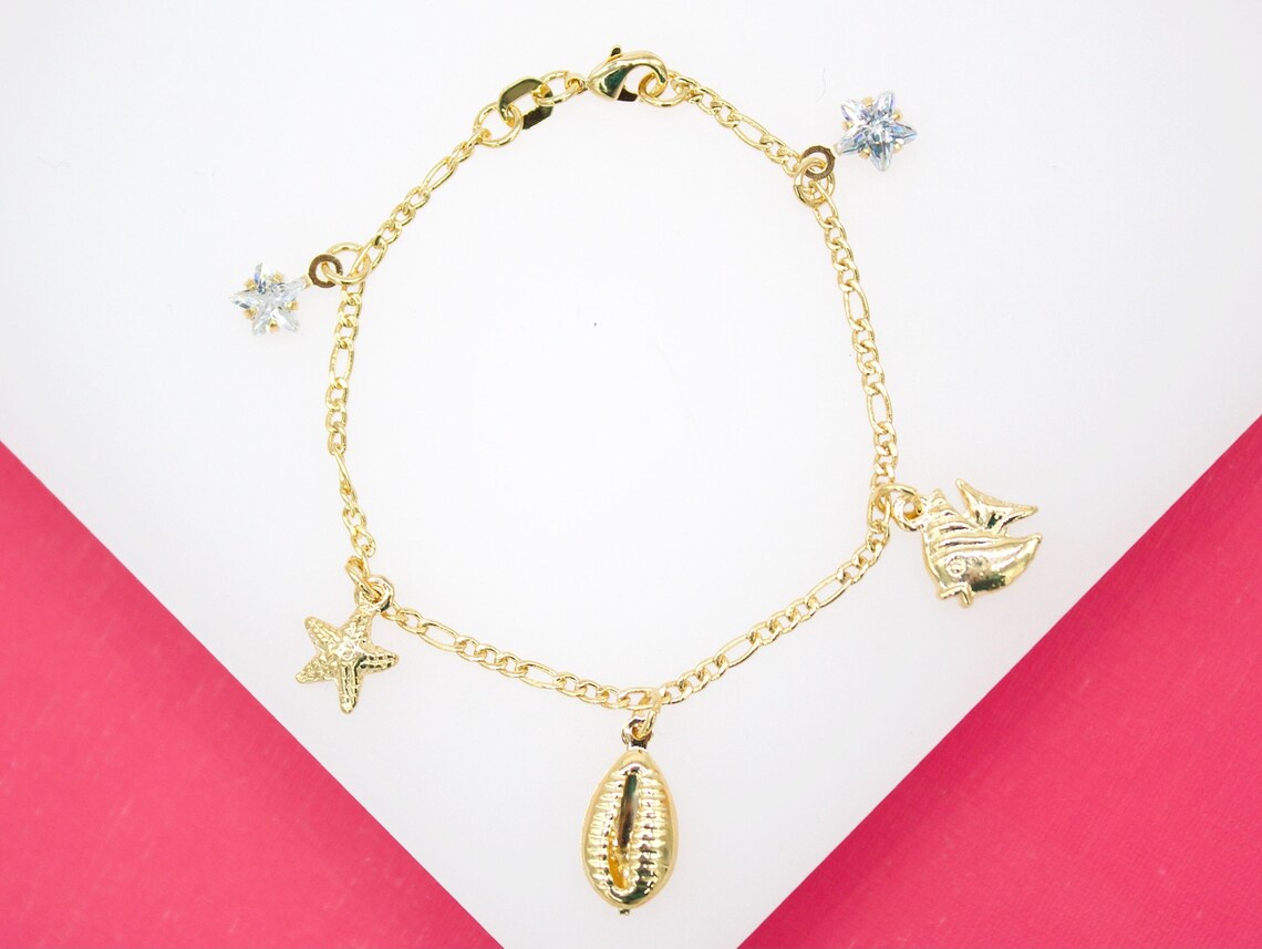 18K Gold Filled Dangle Star Cz Puka Shell Fish Charm Bracelet (XX15)